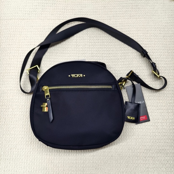 Tumi Handbags - 🌺 TUMI Voyageur Women’s Crossbody Bag